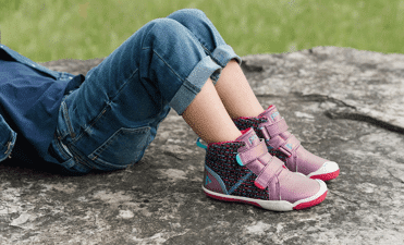 black and red shoes and jeans shorts
